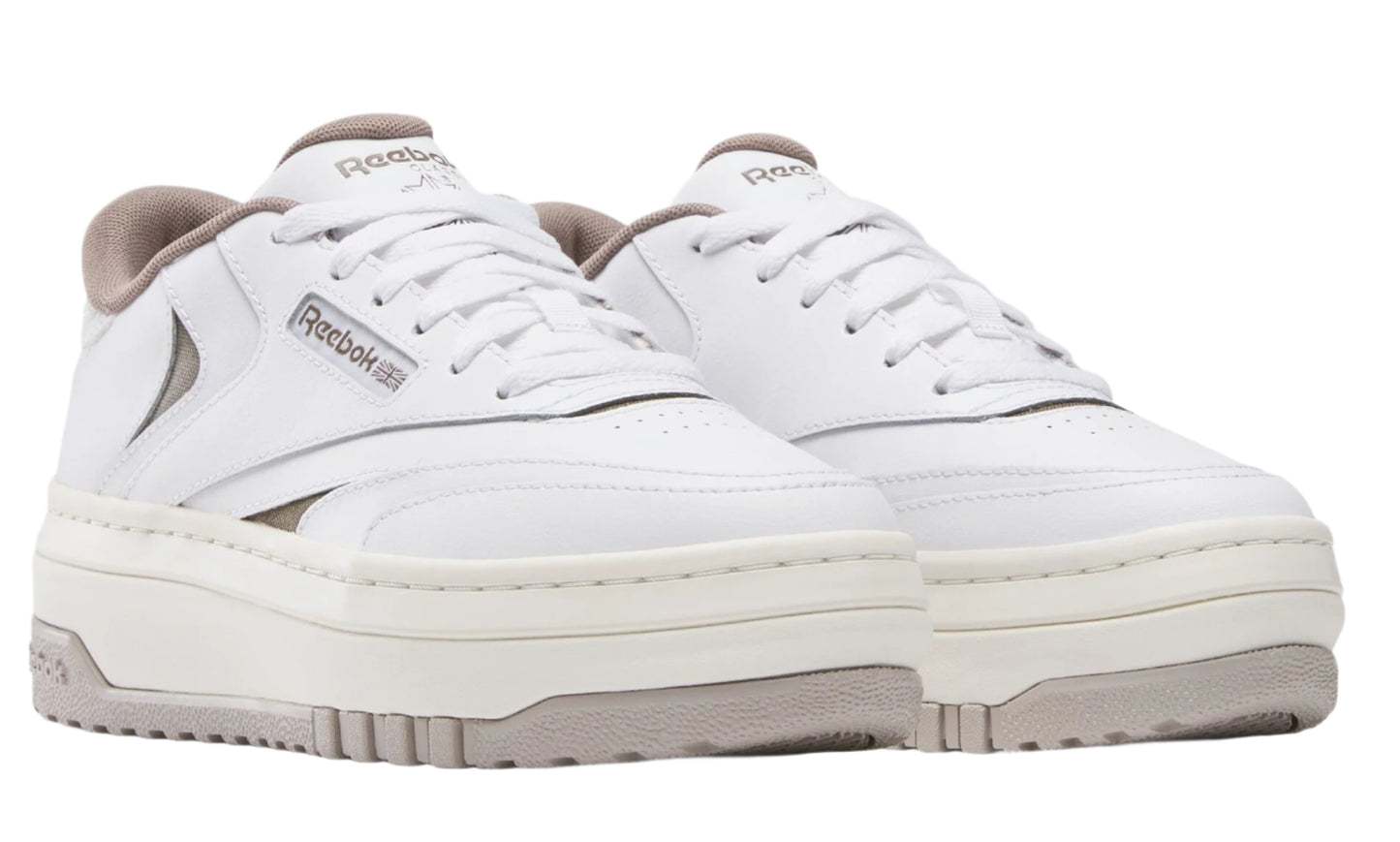 Pair of white platform sneakers with gray accents.