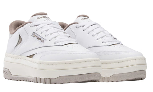 Pair of white platform sneakers with gray accents.