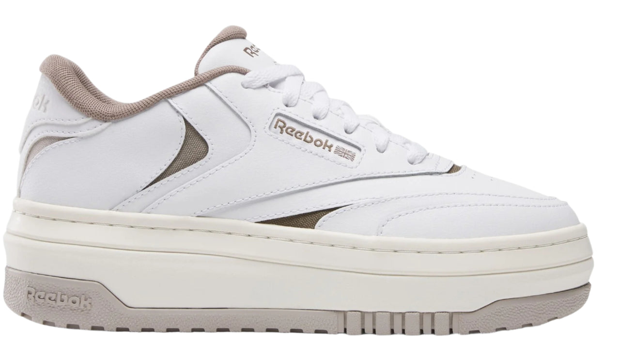 White low top sneaker with a thick off-white sole and gray accents