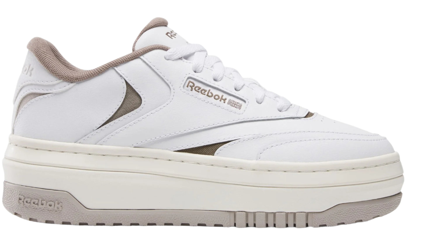 White low top sneaker with a thick off-white sole and gray accents