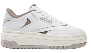 White low top sneaker with a thick off-white sole and gray accents