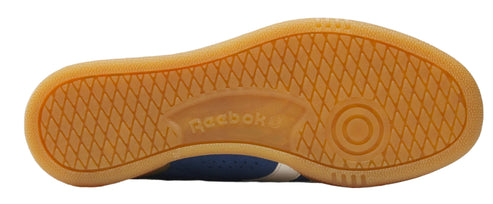 The sole of the shoe is tan with a diamond-shaped tread pattern. It features the text "Reebok" and a circular design at the heel.