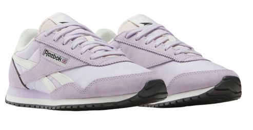 Lavender running shoes with white laces and soles, displaying the word "Reebok" and its logo.