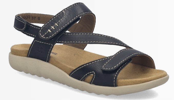 Black sandal with white stitching and velcro straps.