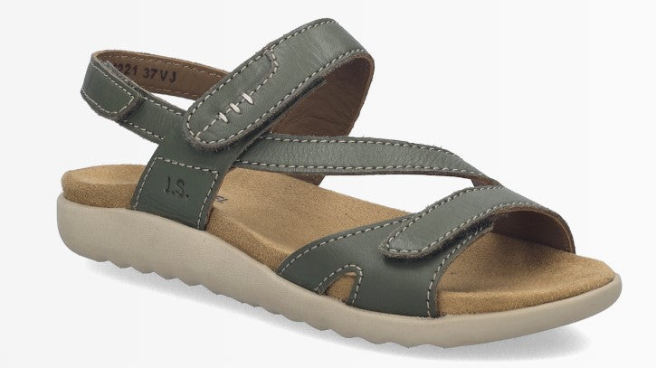 Green sandal with hook and loop straps.