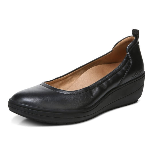A black leather ballet wedge heel shoe.