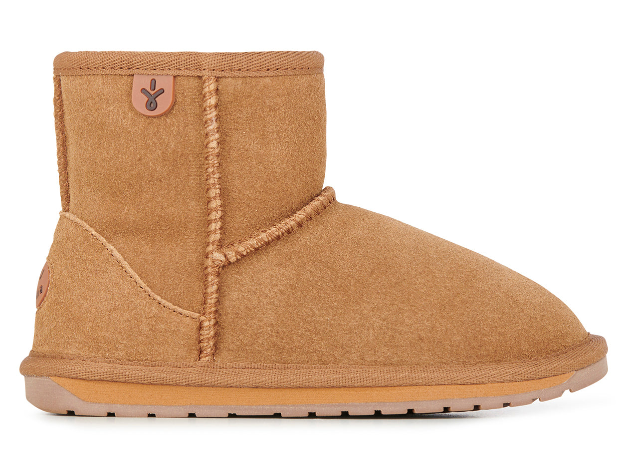 Tan-colored suede ankle boot with a reinforced seam.