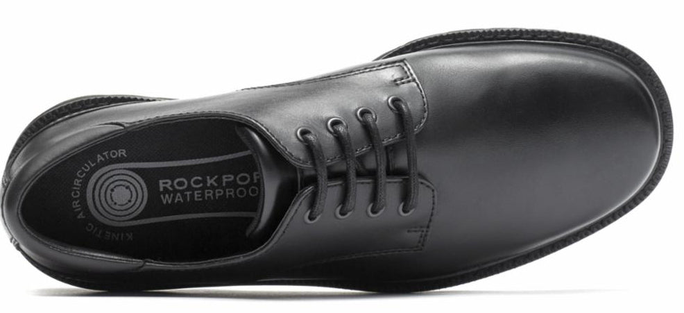 Black leather dress shoe with laces and rounded toe.