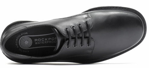 Black leather dress shoe with laces and rounded toe.