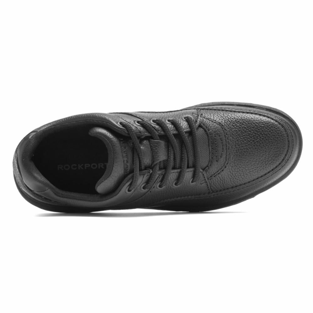 Overhead shot of a black, leather walking shoe with laces.