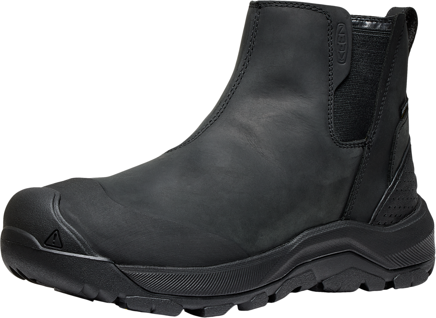 Black Chelsea boot with thick treaded sole and toe cap.