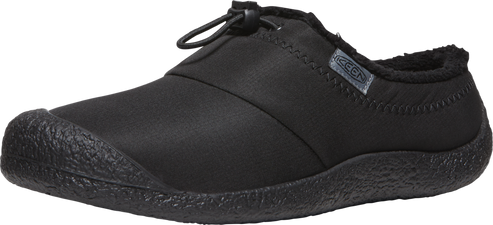 A black slip-on shoe with a rounded toe and a toggle at the top.