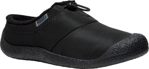A black slip-on shoe with a rounded toe.