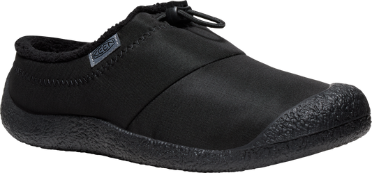 A black slip-on shoe with a rounded toe.