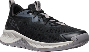 A black low-top trail running shoe with a gray sole, laces, and KEEN logo.