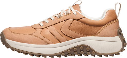 A tan leather sneaker with white laces and a thick white sole.