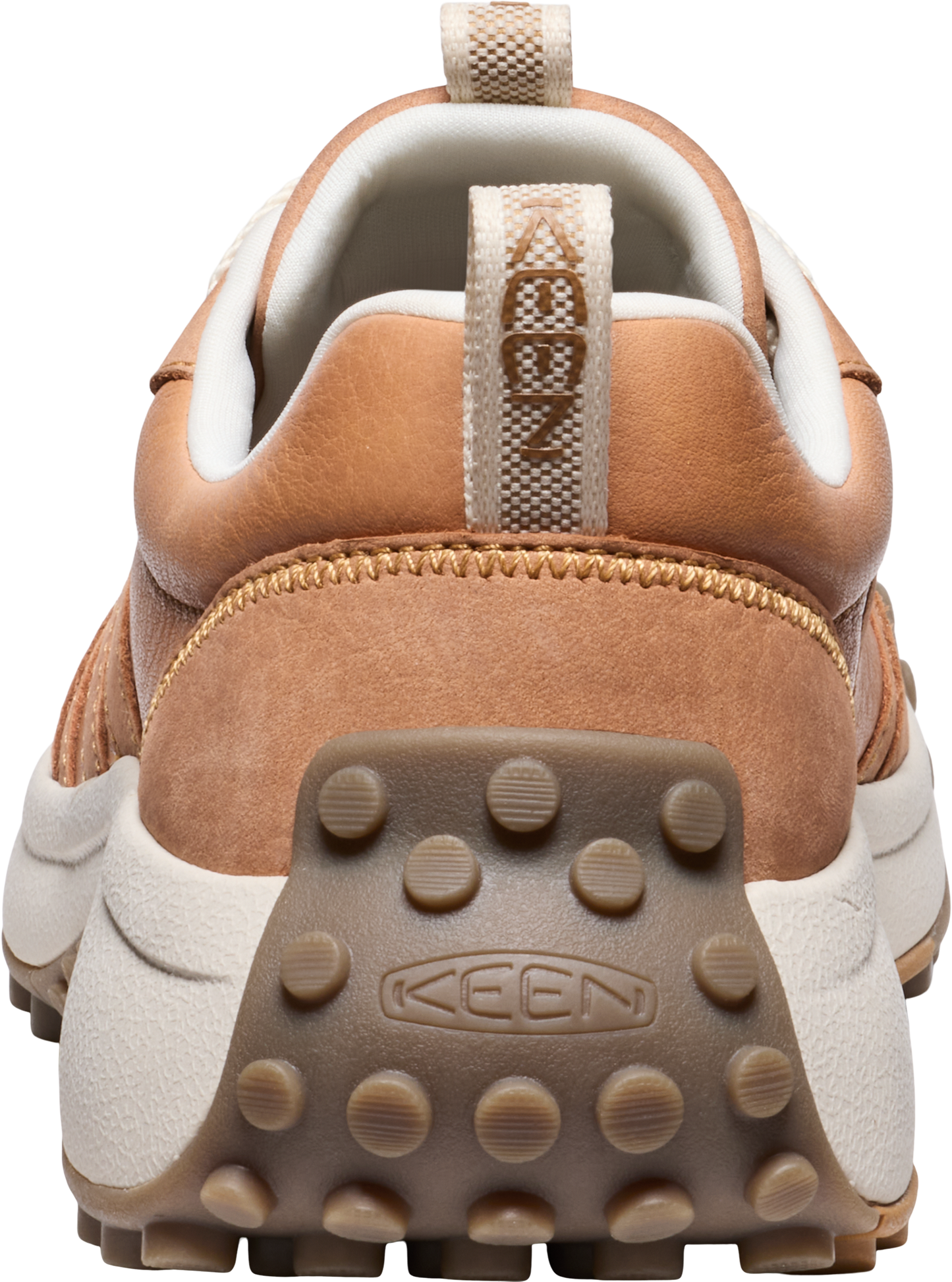 Back view of a tan leather loafer with a white cushioned insole and a brown lug sole; "KEEN" is visible.