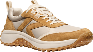 Tan and off-white low profile sneaker with lug sole.