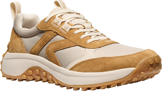 Tan and off-white low profile sneaker with lug sole.