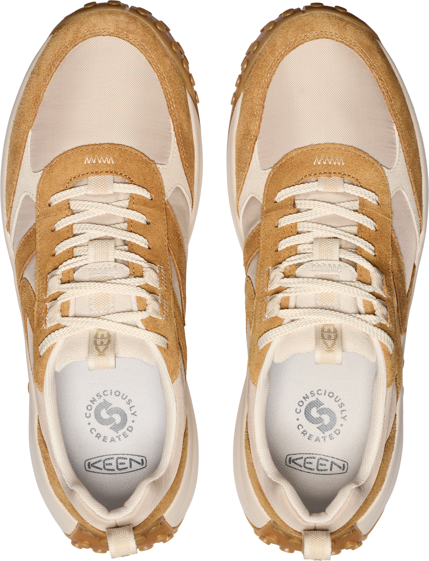Top view of two tan and cream colored sneakers with cream colored laces.
