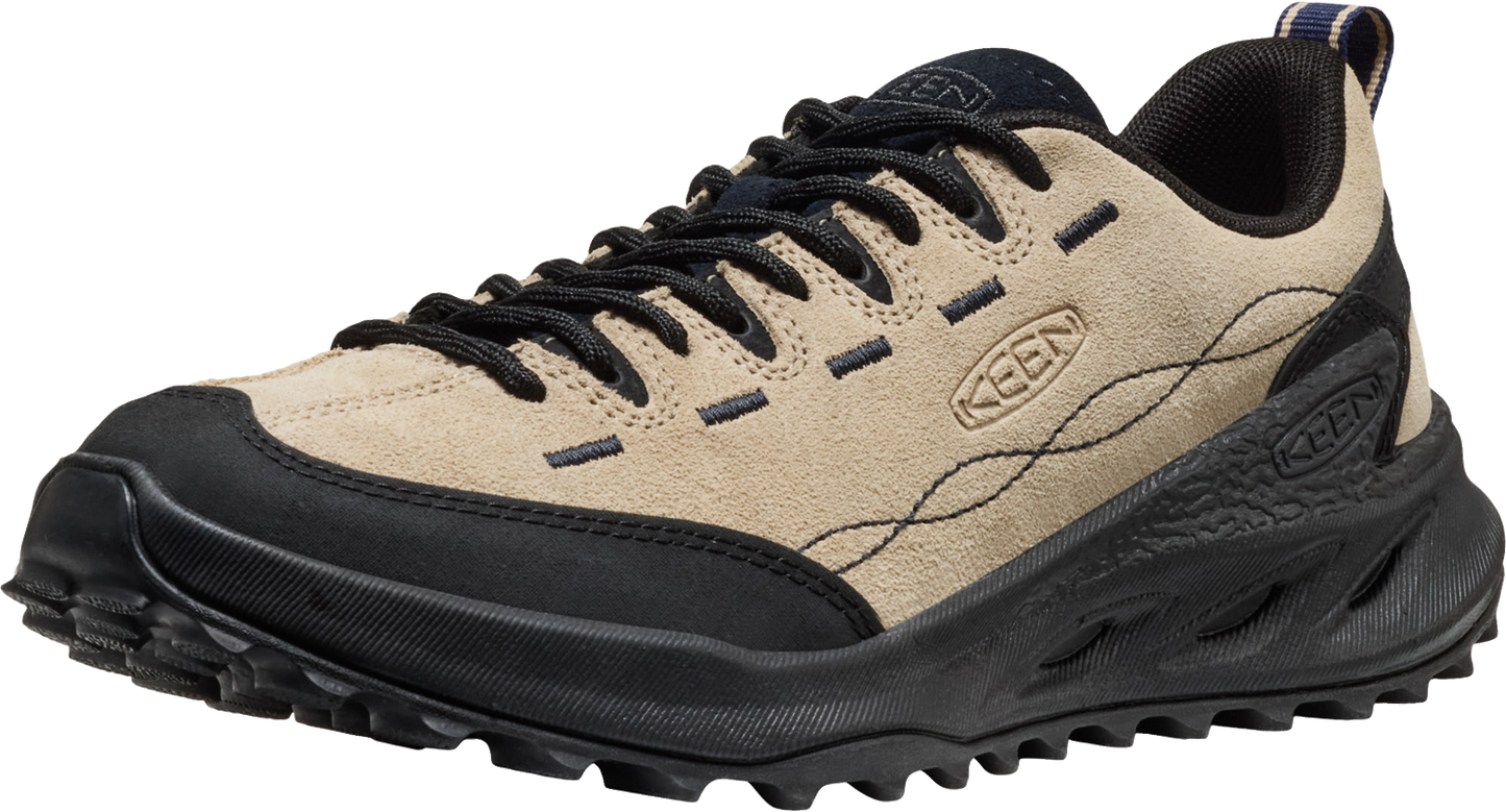 Beige low-top hiking shoe with black laces and sole.