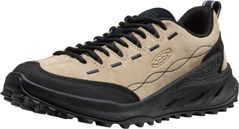 Beige low-top hiking shoe with black laces and sole.