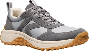 A gray casual sneaker with a tan lug sole and light gray panels.