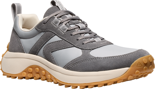 A gray casual sneaker with a tan lug sole and light gray panels.