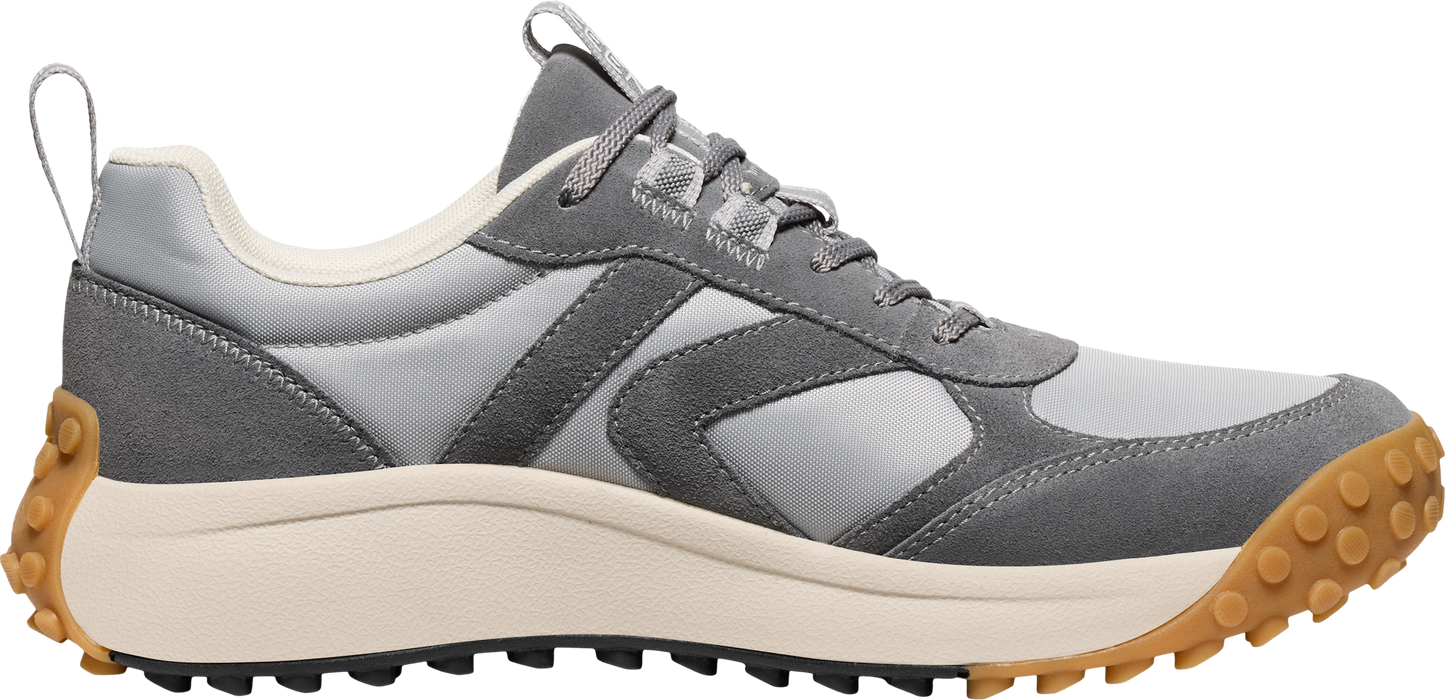 A gray sneaker with a lug sole.