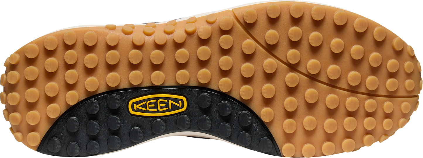 Sole of a shoe with circular treads and a 'KEEN' logo.