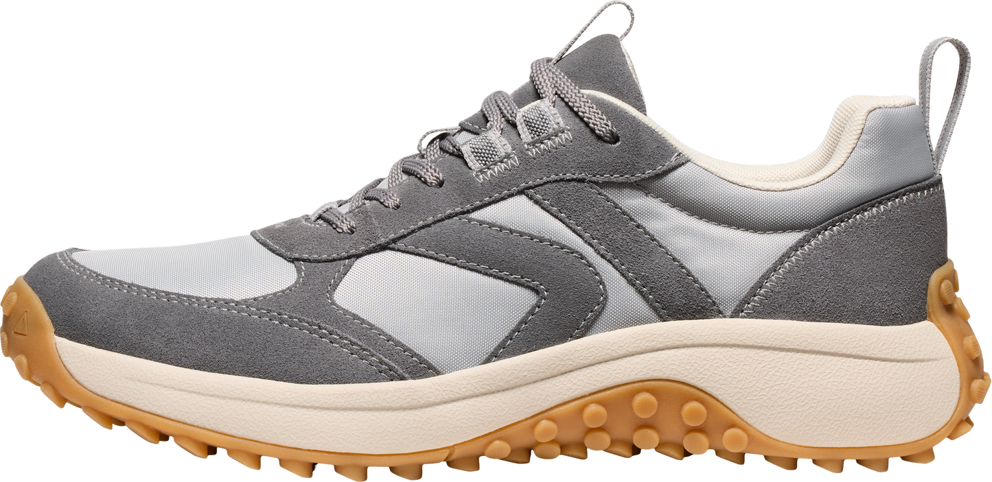 A gray athletic shoe with gray laces and a lug sole.