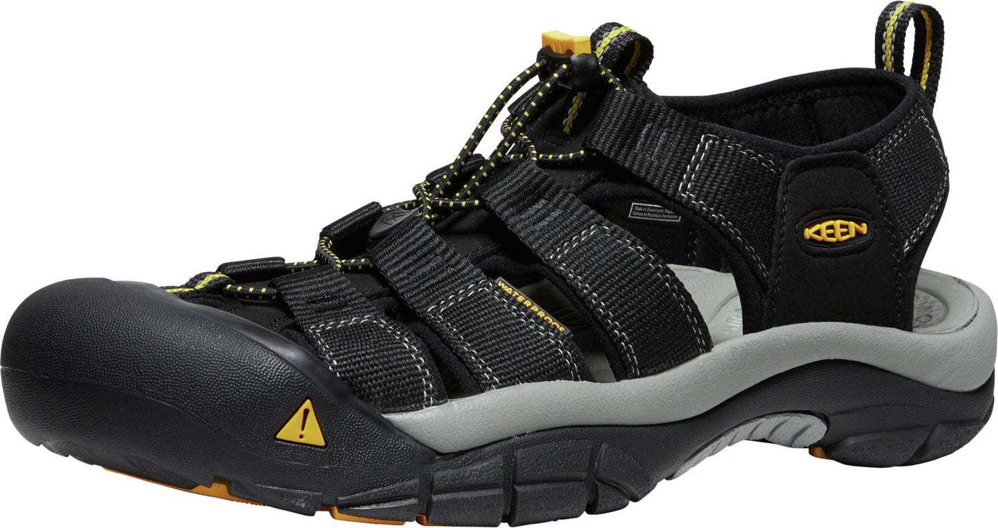 Black hiking sandal with a rounded toe and bungee cord laces.