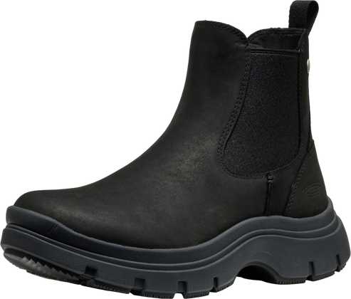 Black Chelsea boot with elastic side panels and a thick lug sole.