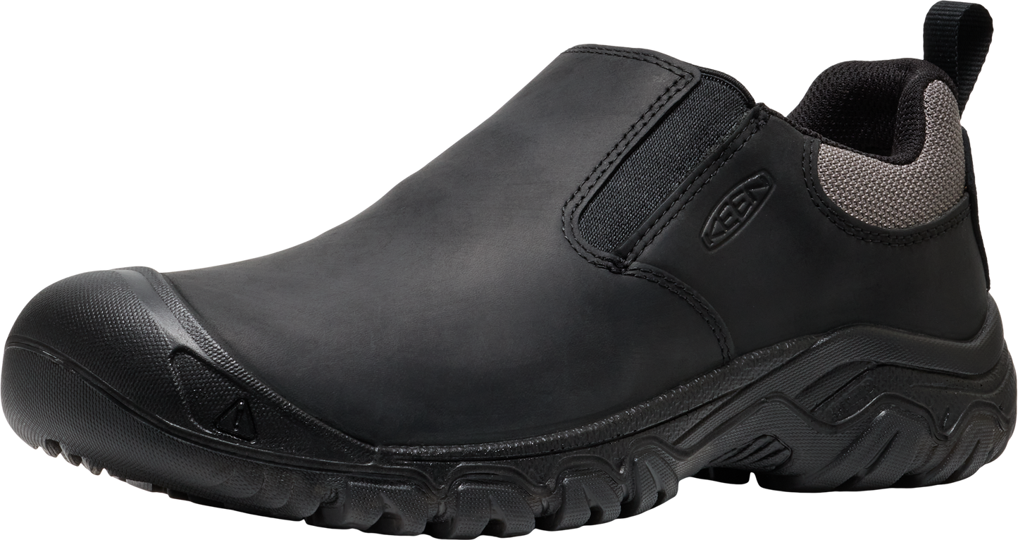 Black slip-on shoe with a rounded toe cap and a textured sole.