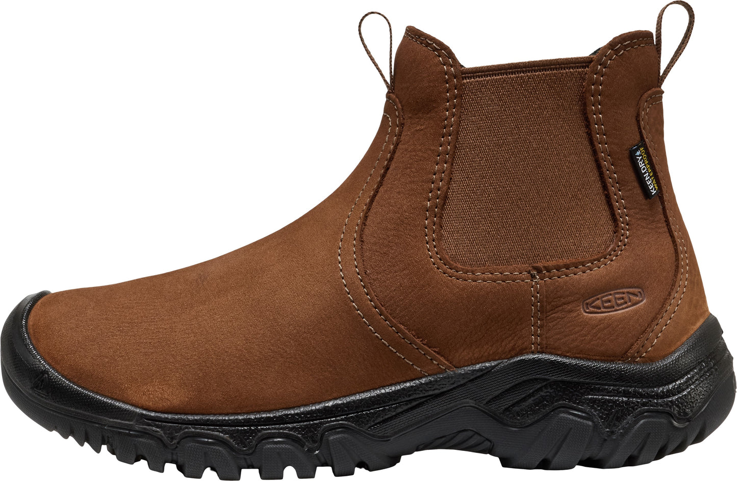 A brown leather Chelsea-style ankle boot with a rugged, thick black lugged rubber sole, elastic side panels, and a small tag on the side that reads KEEN.