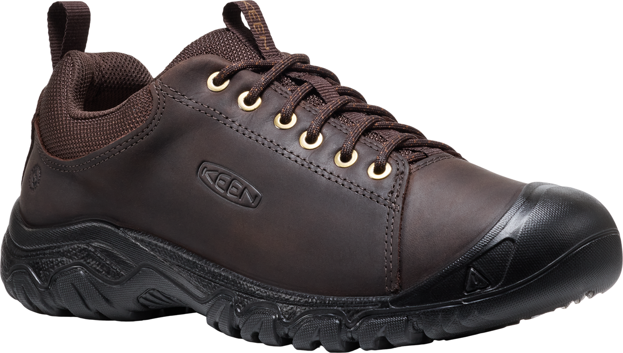 Low-cut brown leather shoe with black rubber toe and sole, laced with brown laces through gold eyelets.