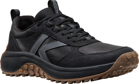 Low-profile black trail shoe with black laces and a brown lugged outsole.