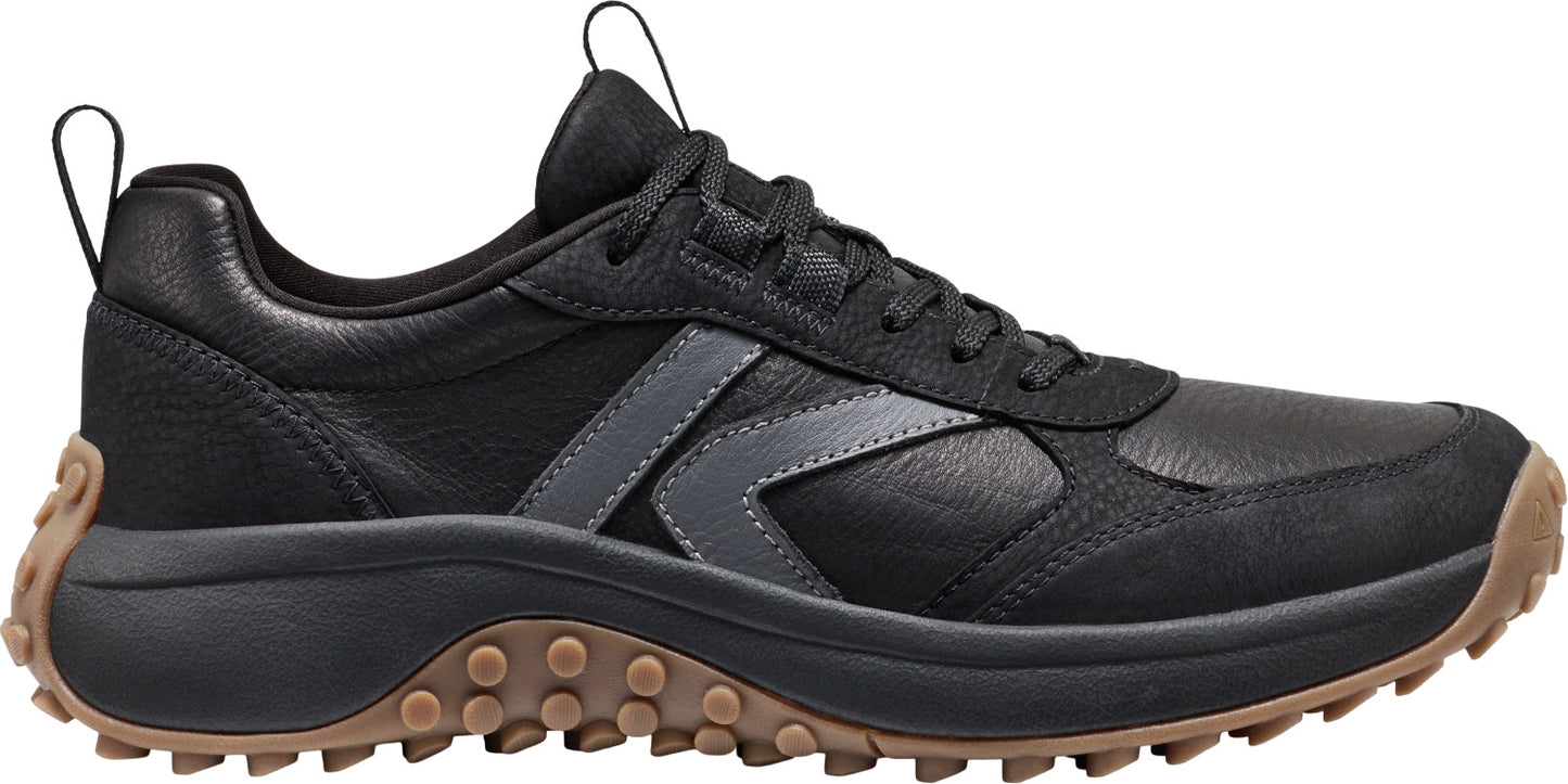 Black leather sneaker with a brown lug sole.