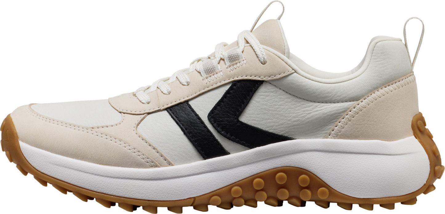 A shoe with a white sole and a black logo.