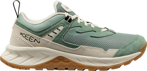 A low-profile shoe with a light green and beige upper and a brown sole.