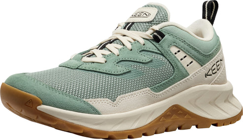 Light-green hiking shoe with tan sole and white laces.