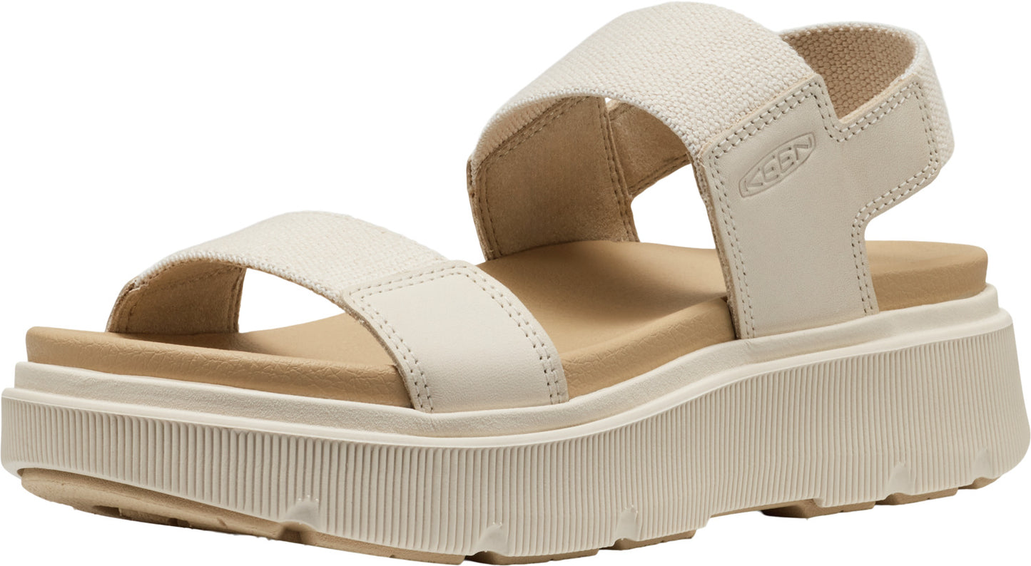 Beige platform sandal with two thick straps.