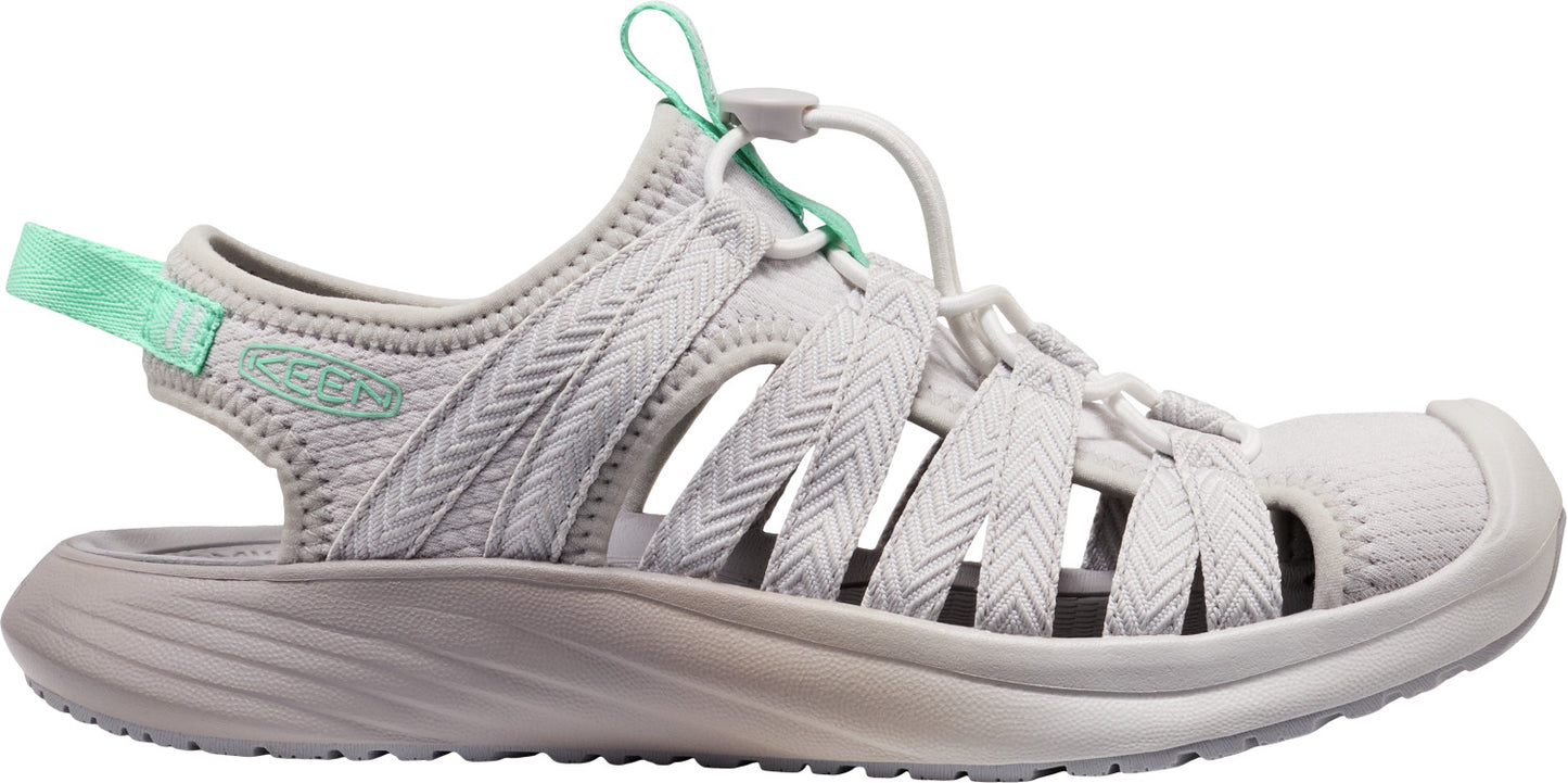 A light gray sandal with turquoise pull tabs and toe bumper.