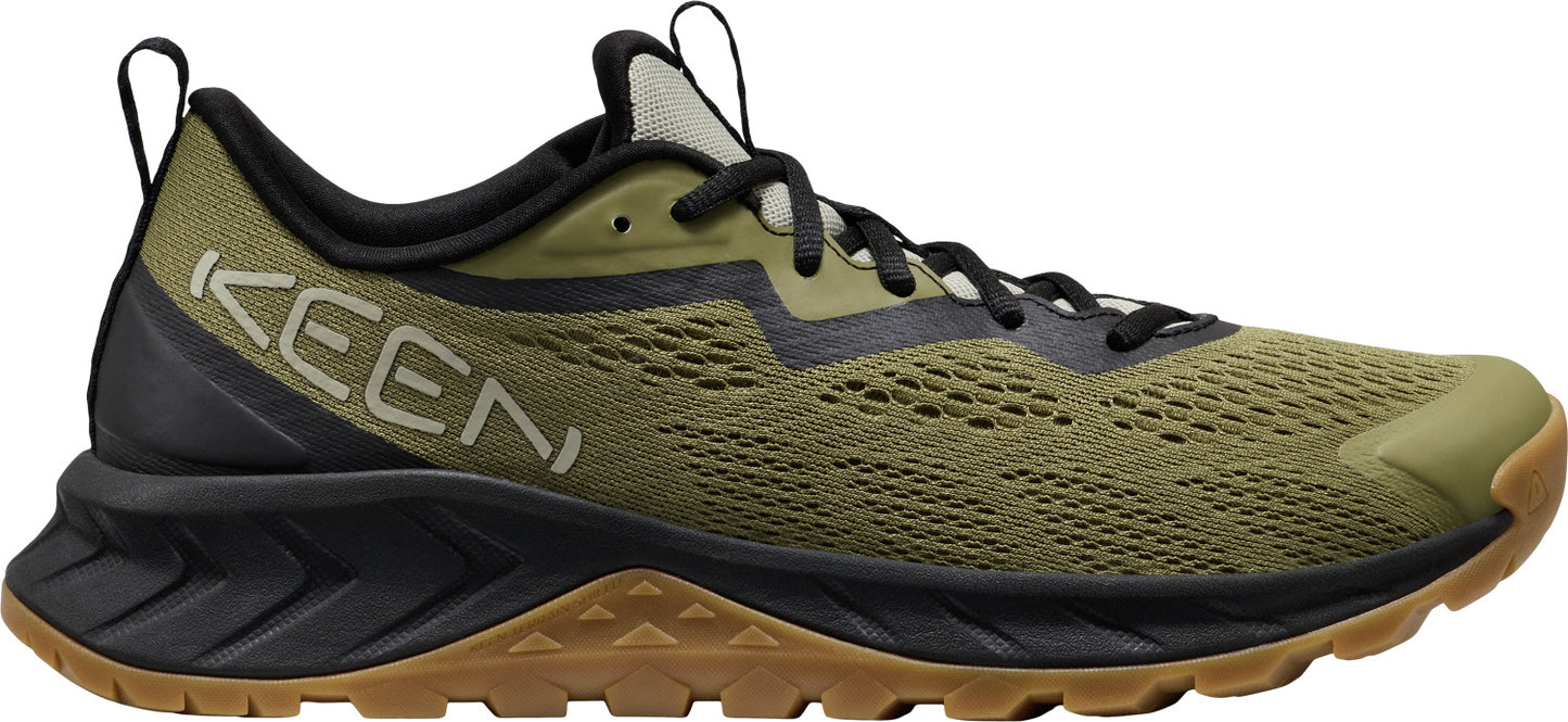 Olive and black low-top hiking shoe with a brown sole and the word KEEN on the side.