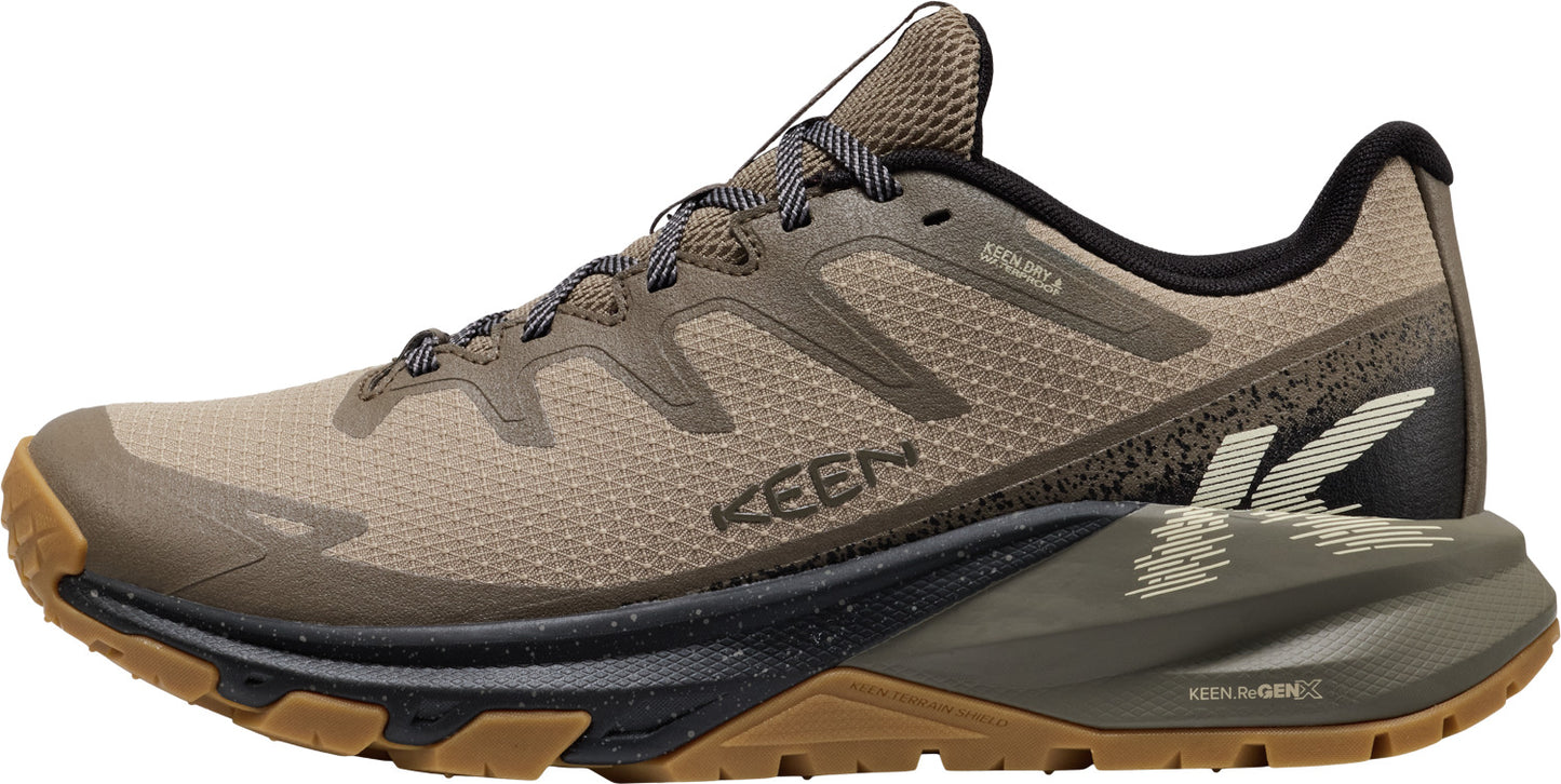 Low-cut brown athletic shoe with a thick, decorative sole and brown laces.
