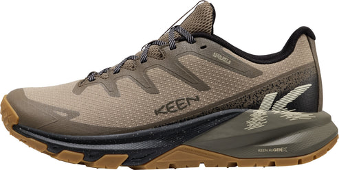 Low-cut brown athletic shoe with a thick, decorative sole and brown laces.
