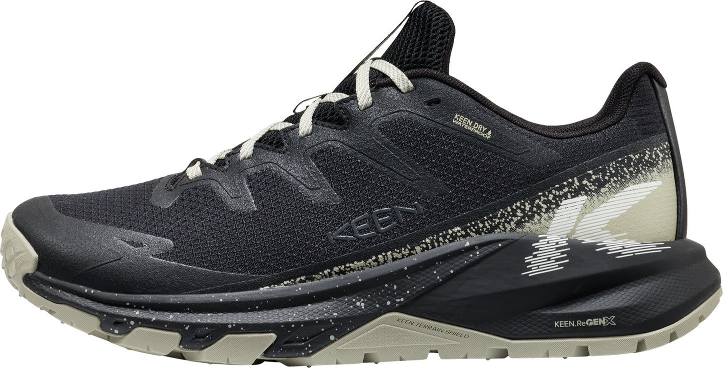 Black trail running shoe with white laces and accents.