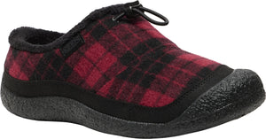 A slip-on shoe with a red and black plaid felt upper, black faux-fur lining, and a rugged black rubber sole and toe cap, featuring a bungee cord adjustment on the top.
