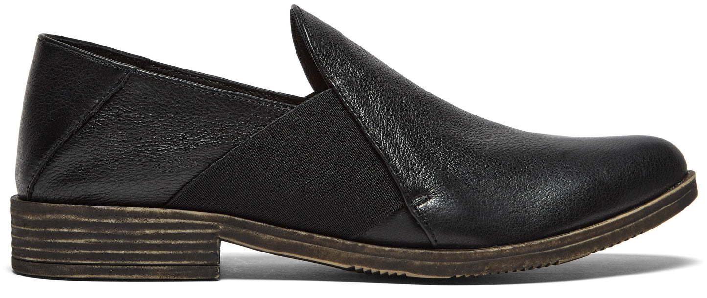 A black leather loafer with a low heel.
