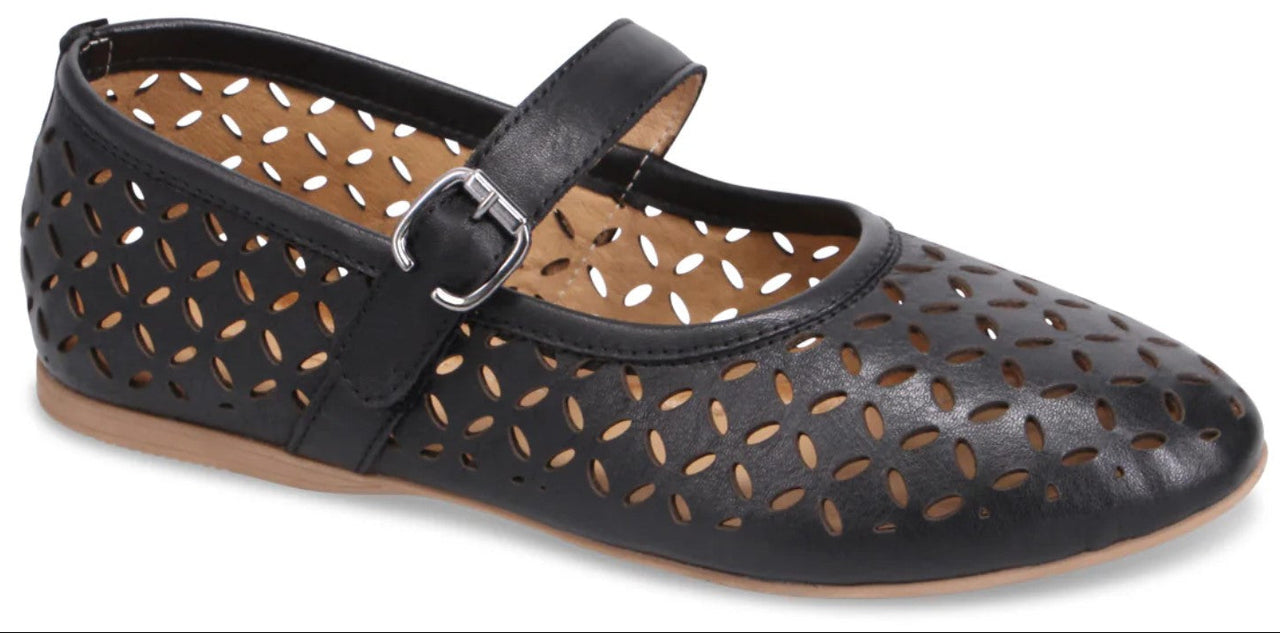 A black Mary Jane shoe with floral cutouts and a buckled strap.